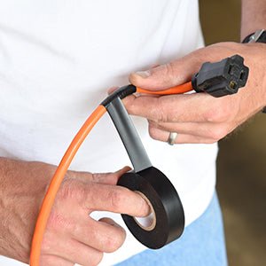 using black electrical tape to cover small puncture in cable