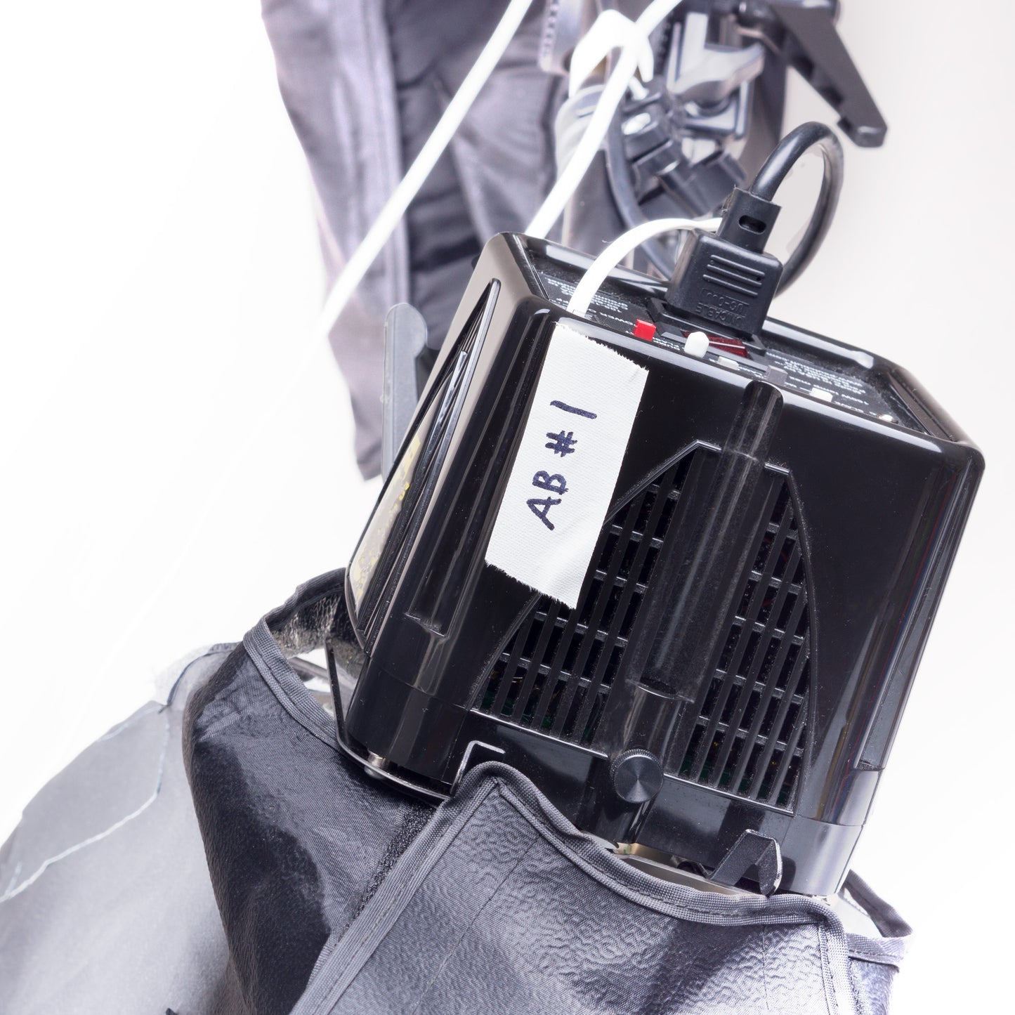 White gaffer tape used to label camera gear for organization during video production