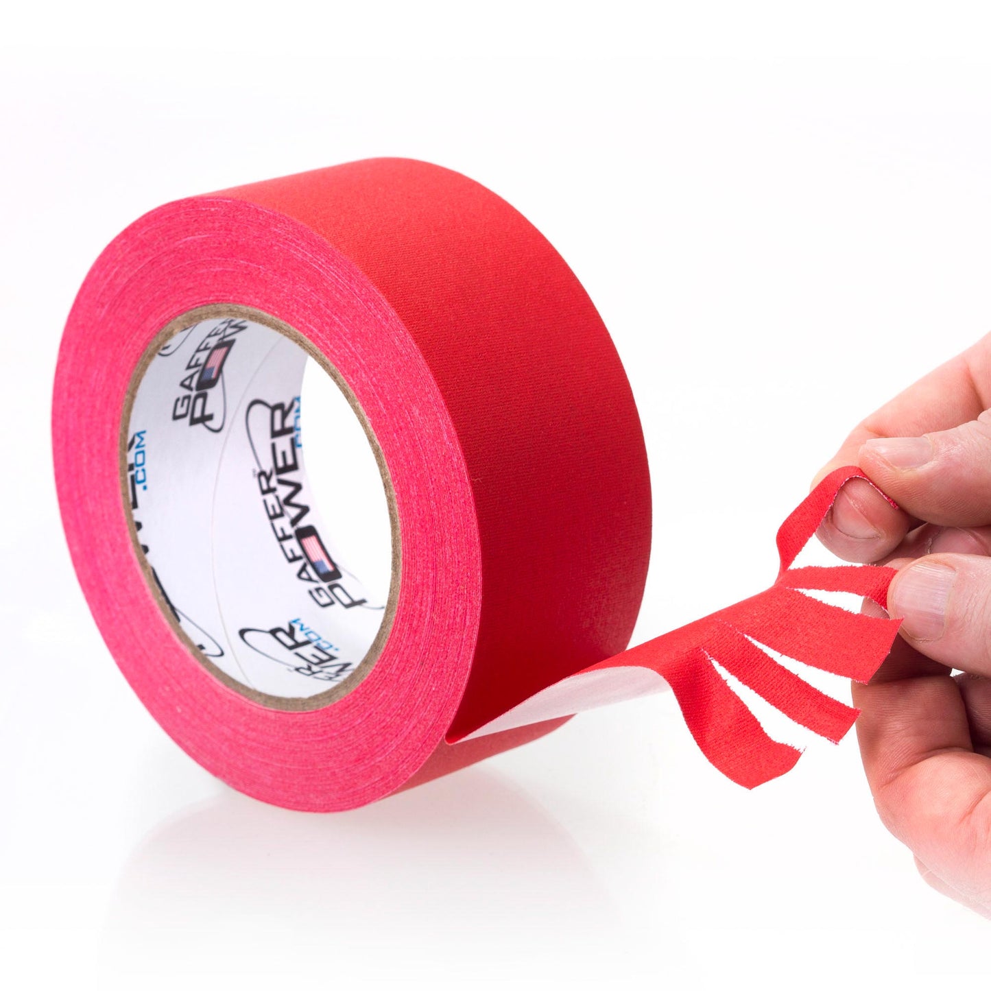 Close up of red gaffer tape being torn by hand showing easy tear cloth backing